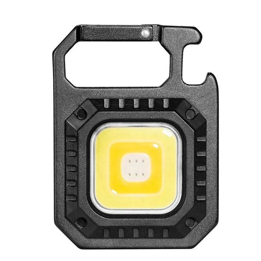 Mini lanterna LED com íman, luz COB, ideal para camping ao ar livre e uso no trabalho. Compacta para bolso, com 800 lúmens, recarregável por USB e 7 modos de iluminação