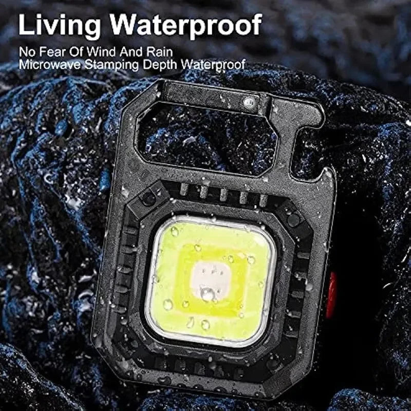 Mini lanterna LED com íman, luz COB, ideal para camping ao ar livre e uso no trabalho. Compacta para bolso, com 800 lúmens, recarregável por USB e 7 modos de iluminação