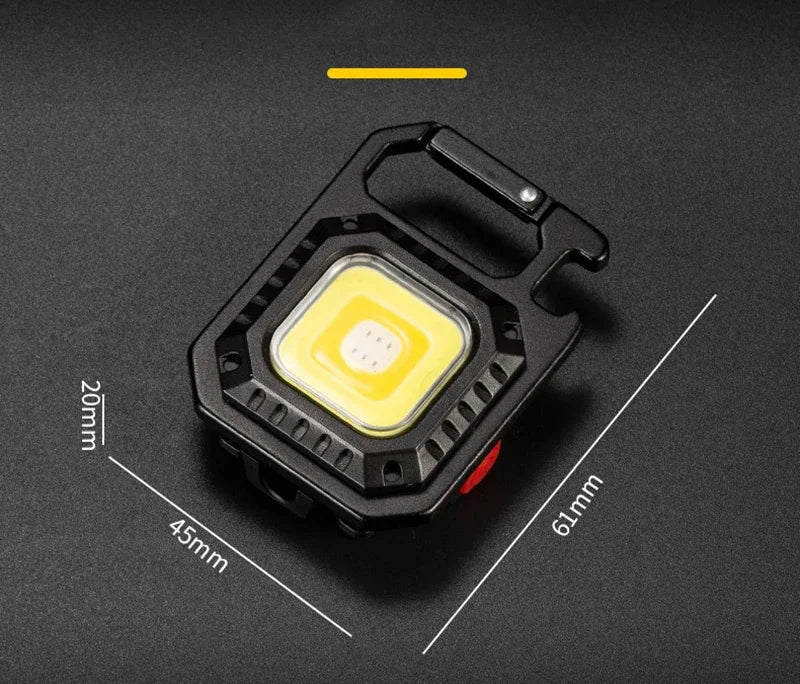 Mini lanterna LED com íman, luz COB, ideal para camping ao ar livre e uso no trabalho. Compacta para bolso, com 800 lúmens, recarregável por USB e 7 modos de iluminação